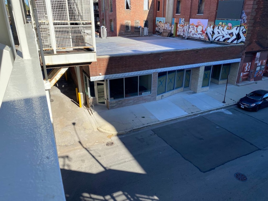 Forum cafe, forum cafe train tracks platform, 43rd El Stop